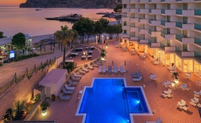 Hotel and swimming pools general night view